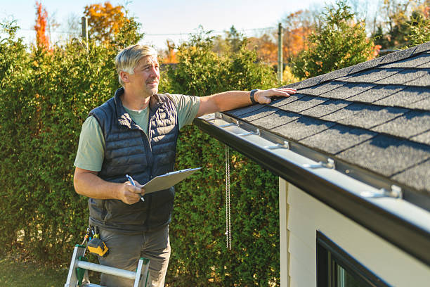Professional Roof Replacement technician working in Prairie, MS